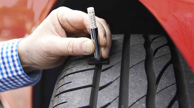 testing-tread-depth-on-a-tyre-630x350